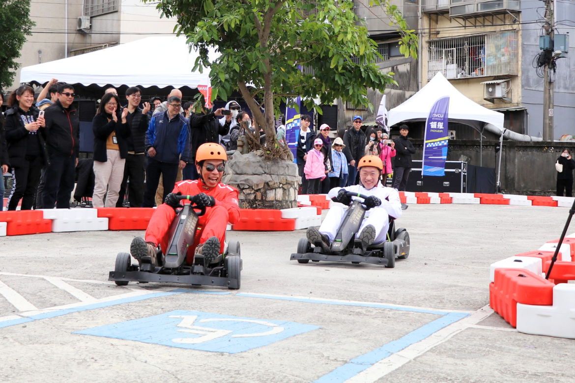The campus parking lot was transformed into a temporary racetrack where students and faculty competed together.