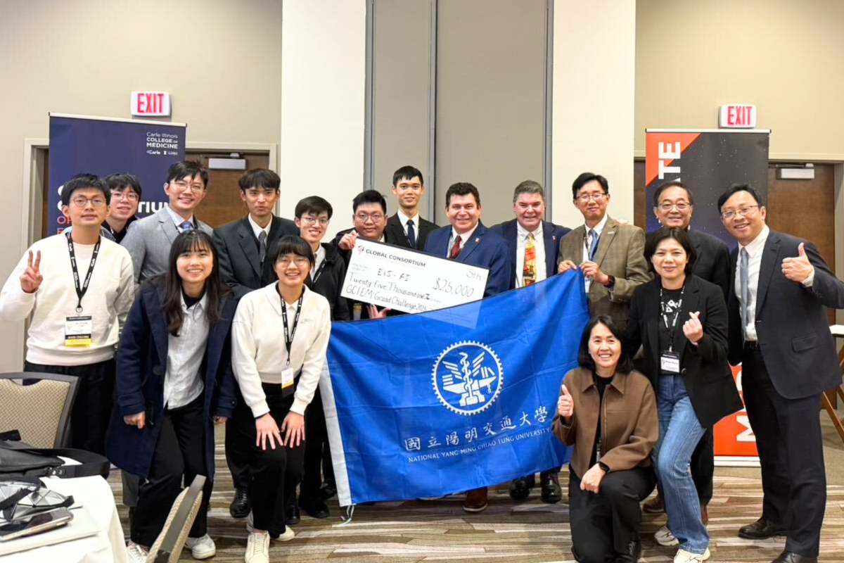 NYCU students and faculty participants pose for a photograph with Dean Mark Cohen and Executive Deputy Dean Greg Polites.