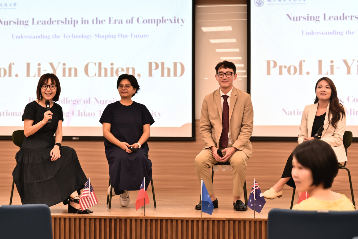 Faculty members, students and international speakers exchange ideas during the symposium’s discussion session.