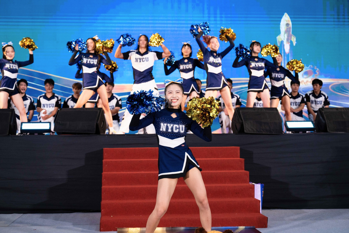The cheerleading squad delivers an energetic performance at the freshman convocation.